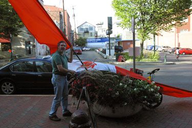 Bill with flags -- photo by Andy Qualls