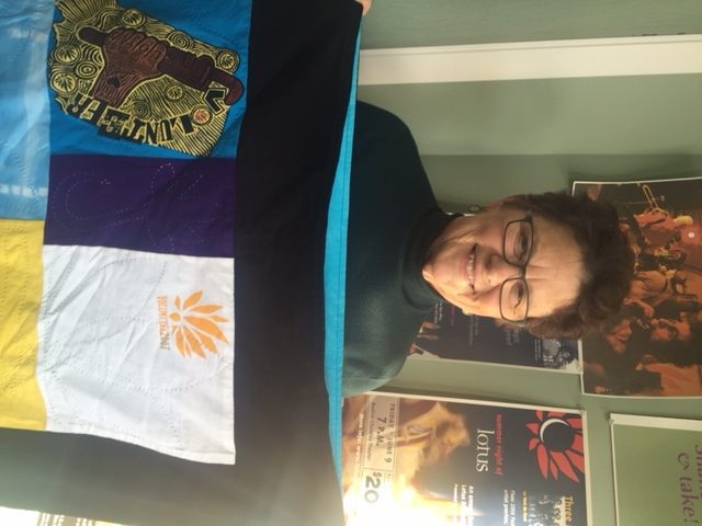 Patty Callison Receives Volunteers of Lotus Quilt
